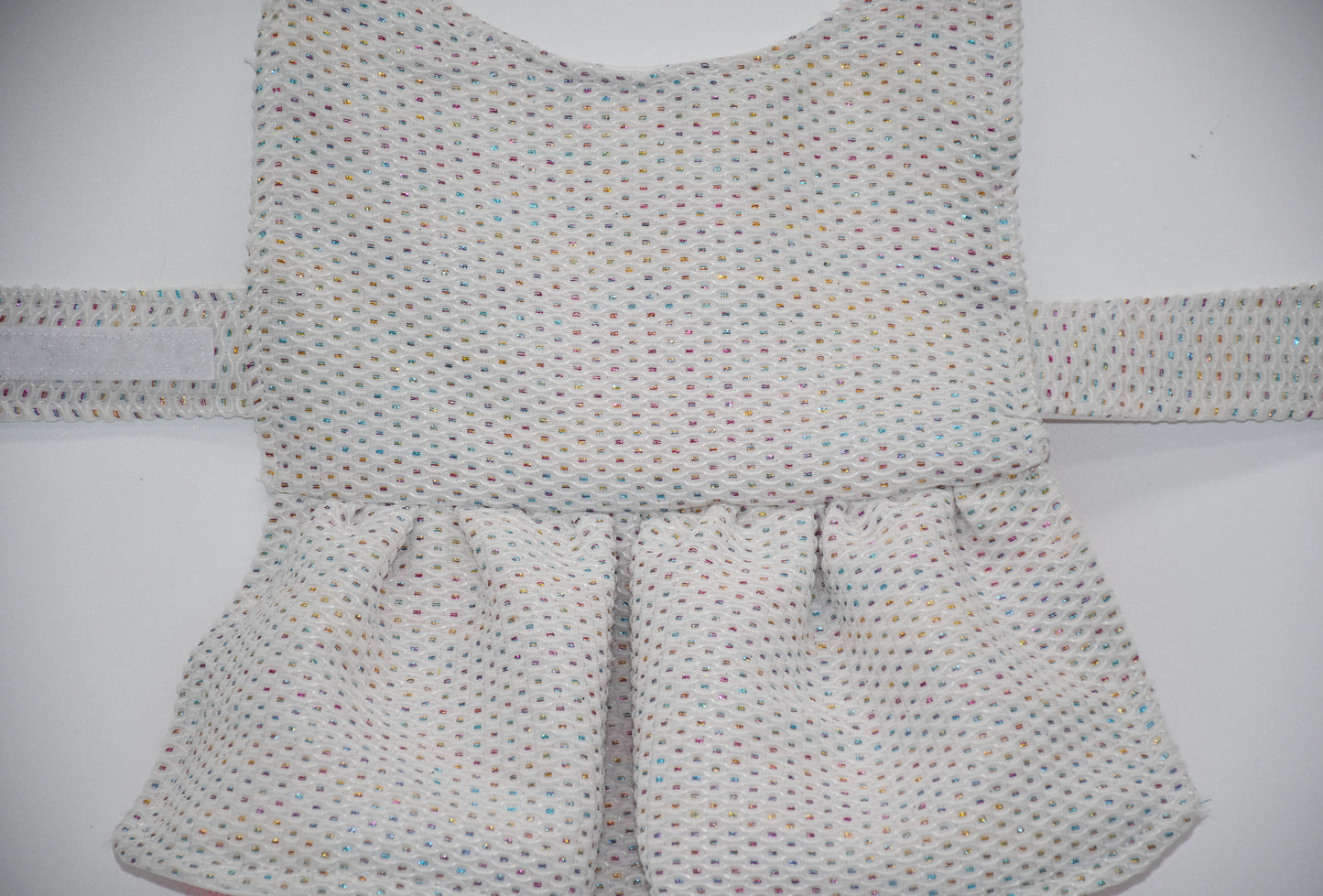 doll dog costume in colorful dots
