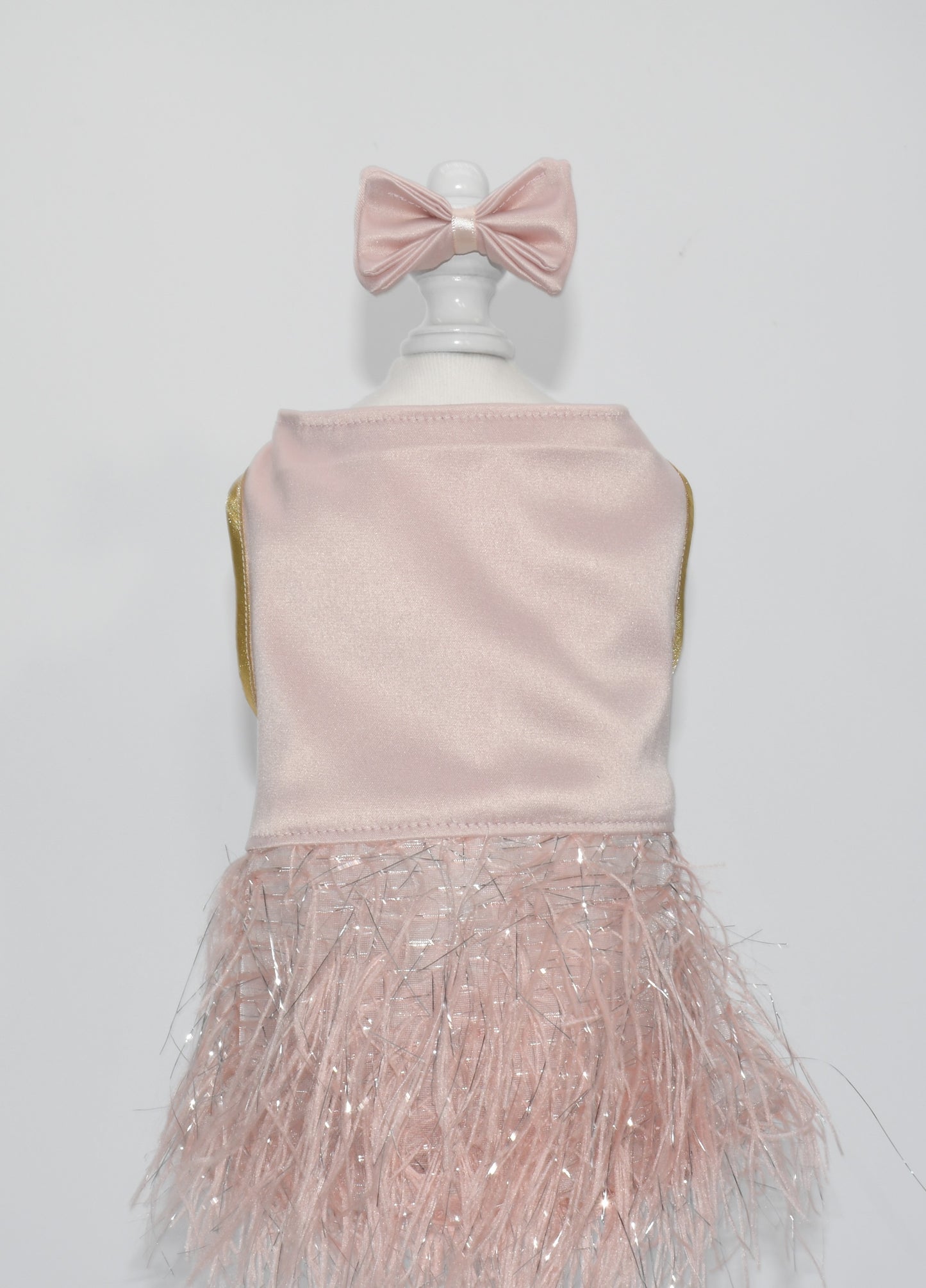the pet dress is on a dress form