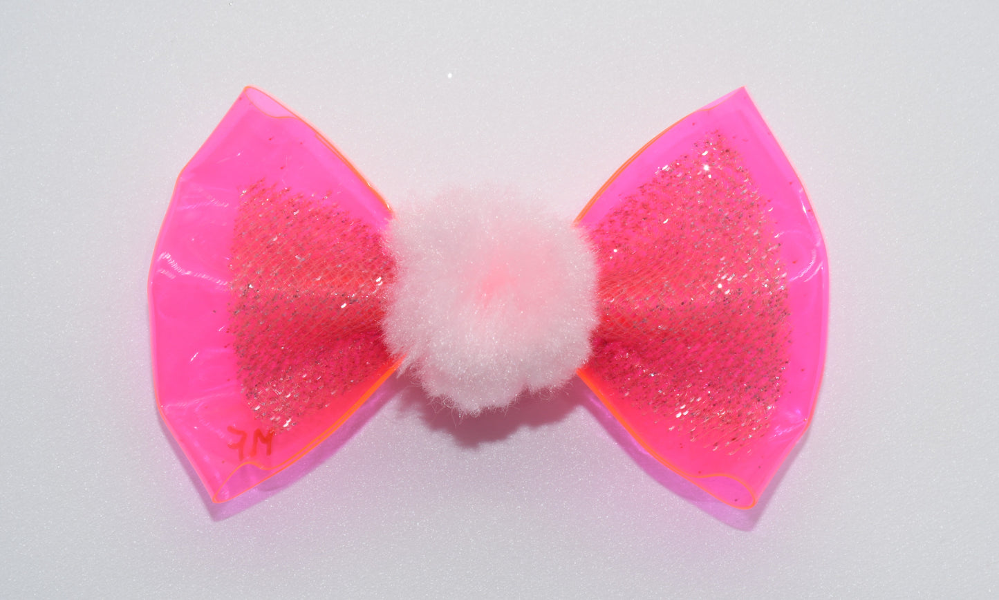 a pink vinyl pet hair bow