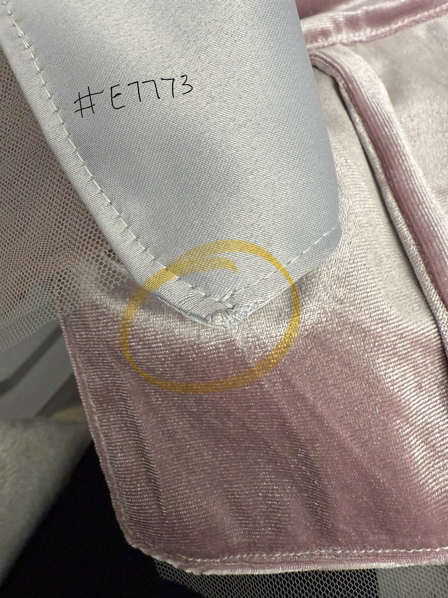 a close up of imperfection. this is an outlet dress.