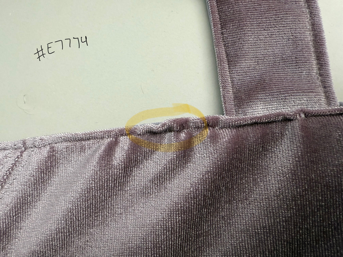 a close up of imperfection. this is an outlet dress.