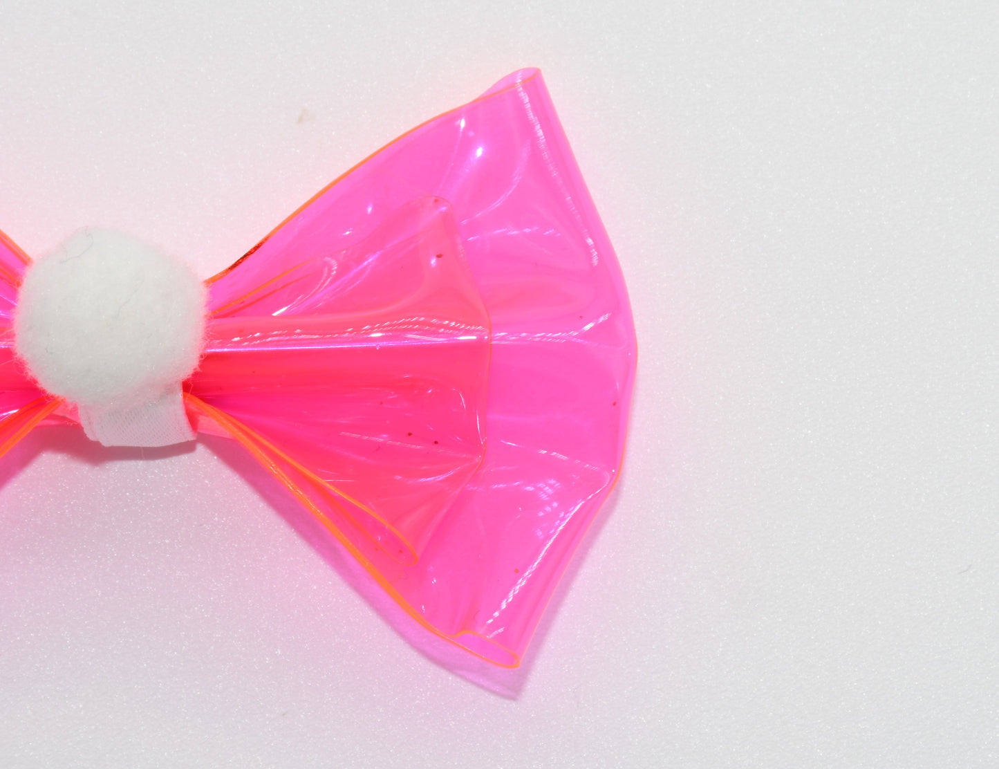 pink hairbow with pom pom