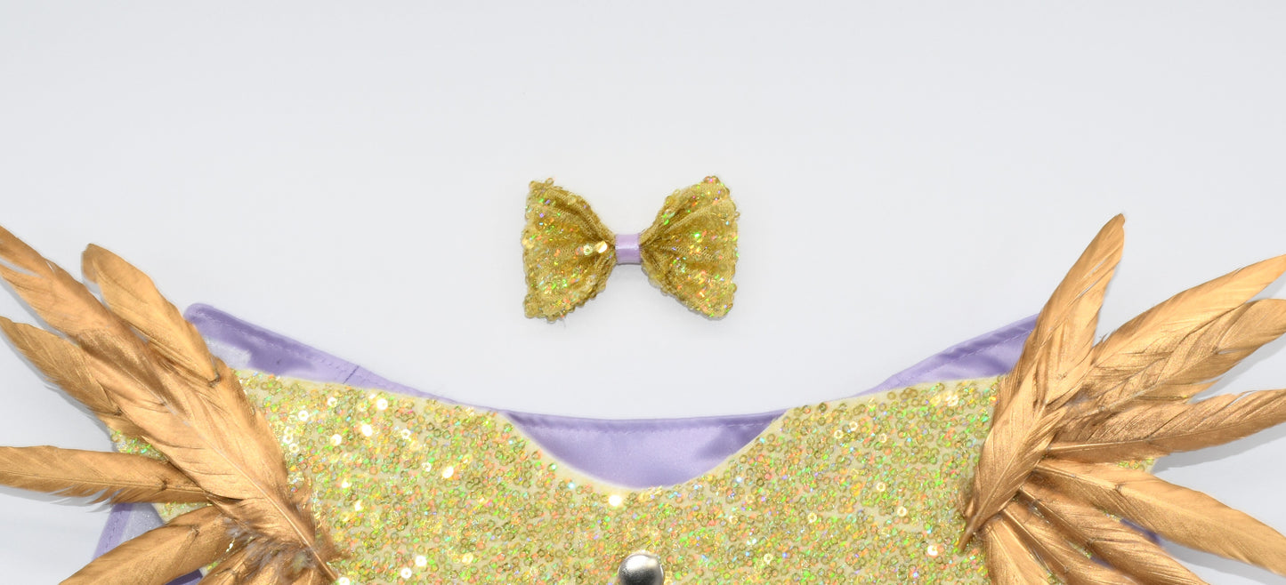 a detailed view of golden pet hair bow
