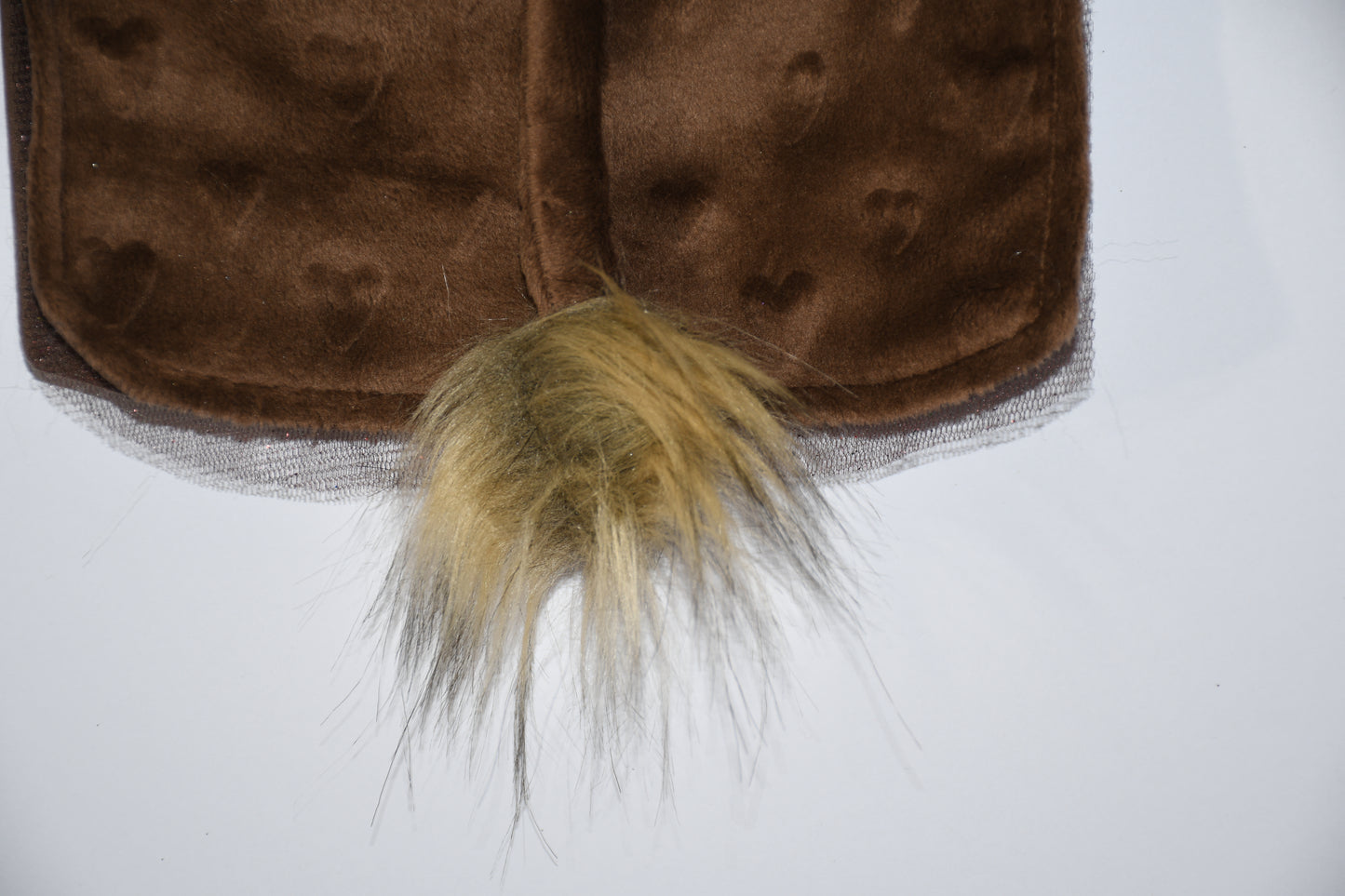 a tail with pom pom