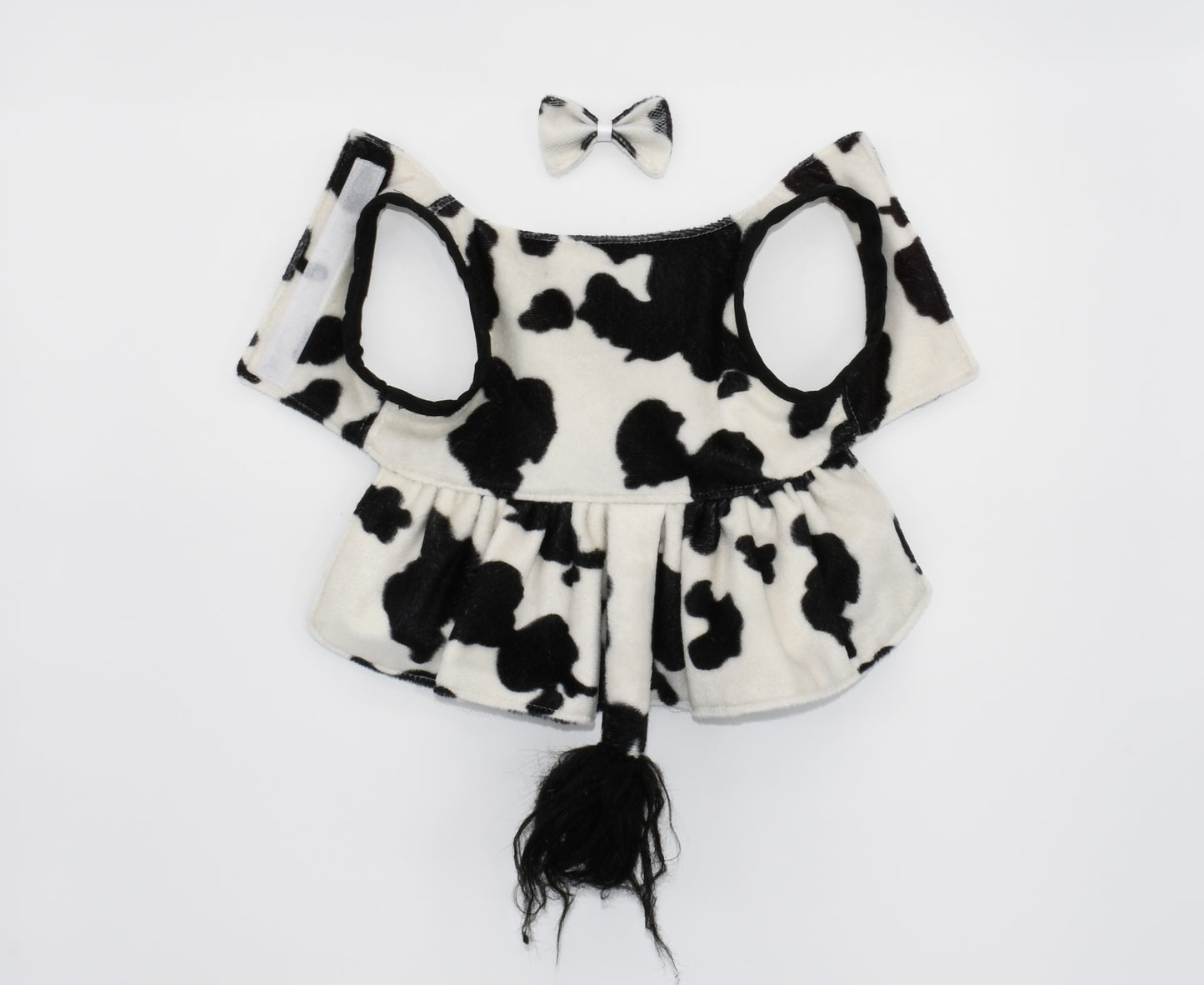 a view of the dress and the hair bow