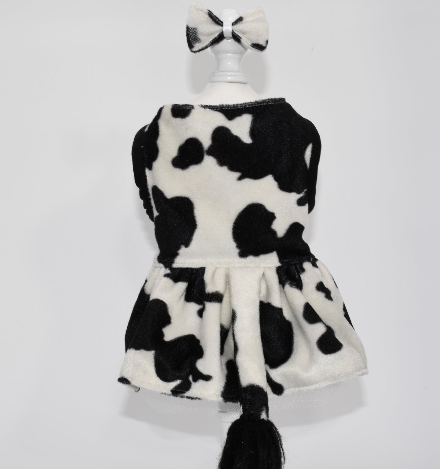 the pet dress is on a dress form