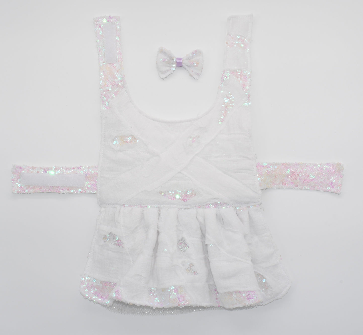 a view of the entire dress and pet hair bow