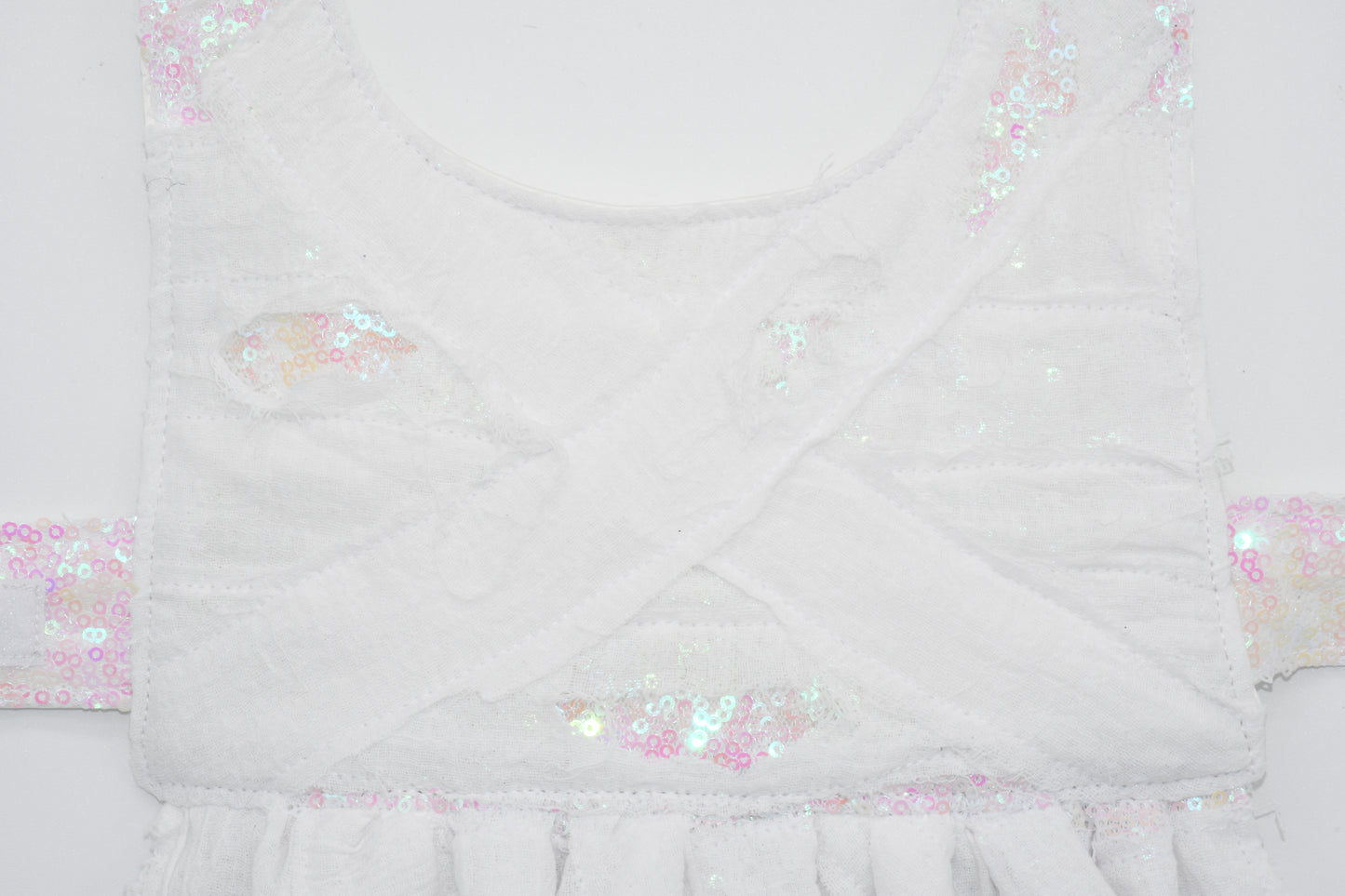a closeup at bodice and torn details