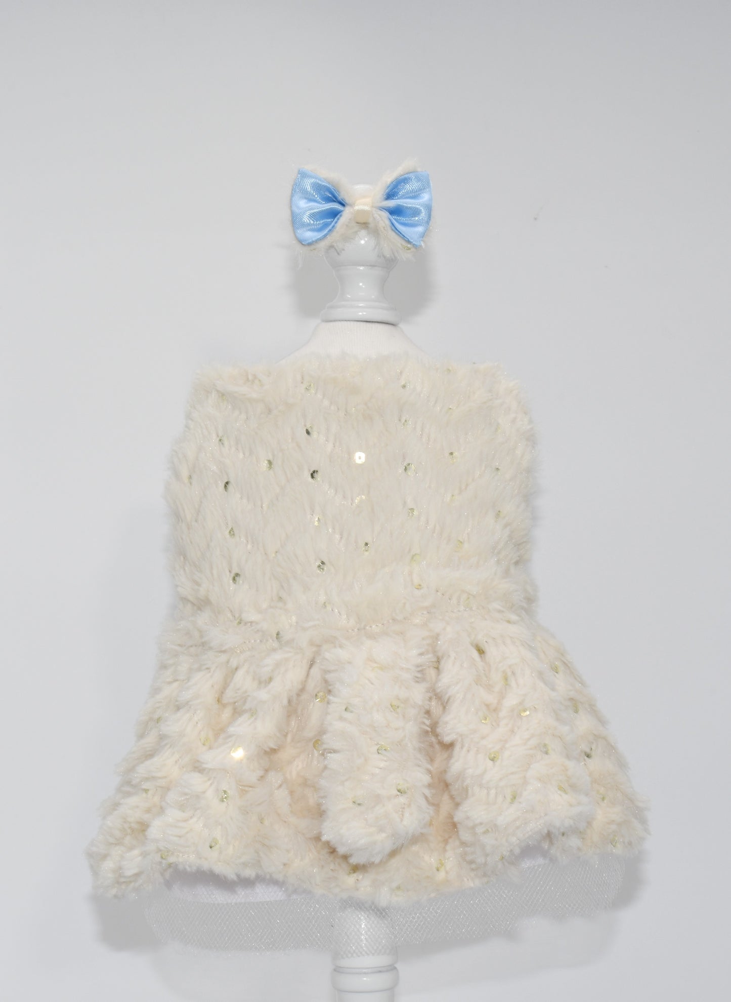The pet dress is on a dress form