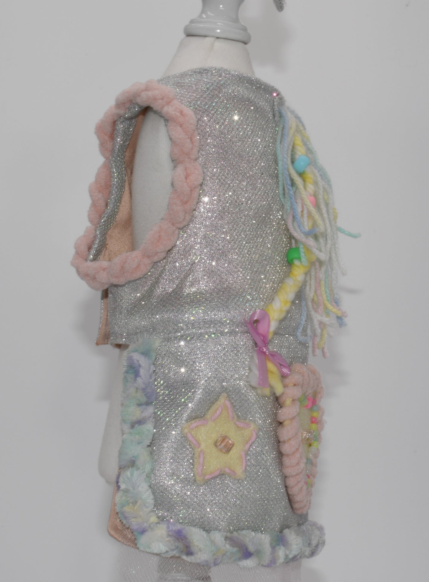 a side view of the pet dress on a dress form