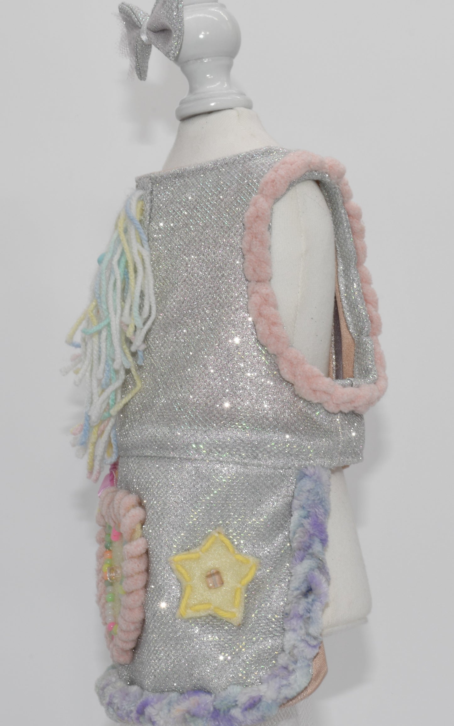 another side view of the pet dress on a dress form
