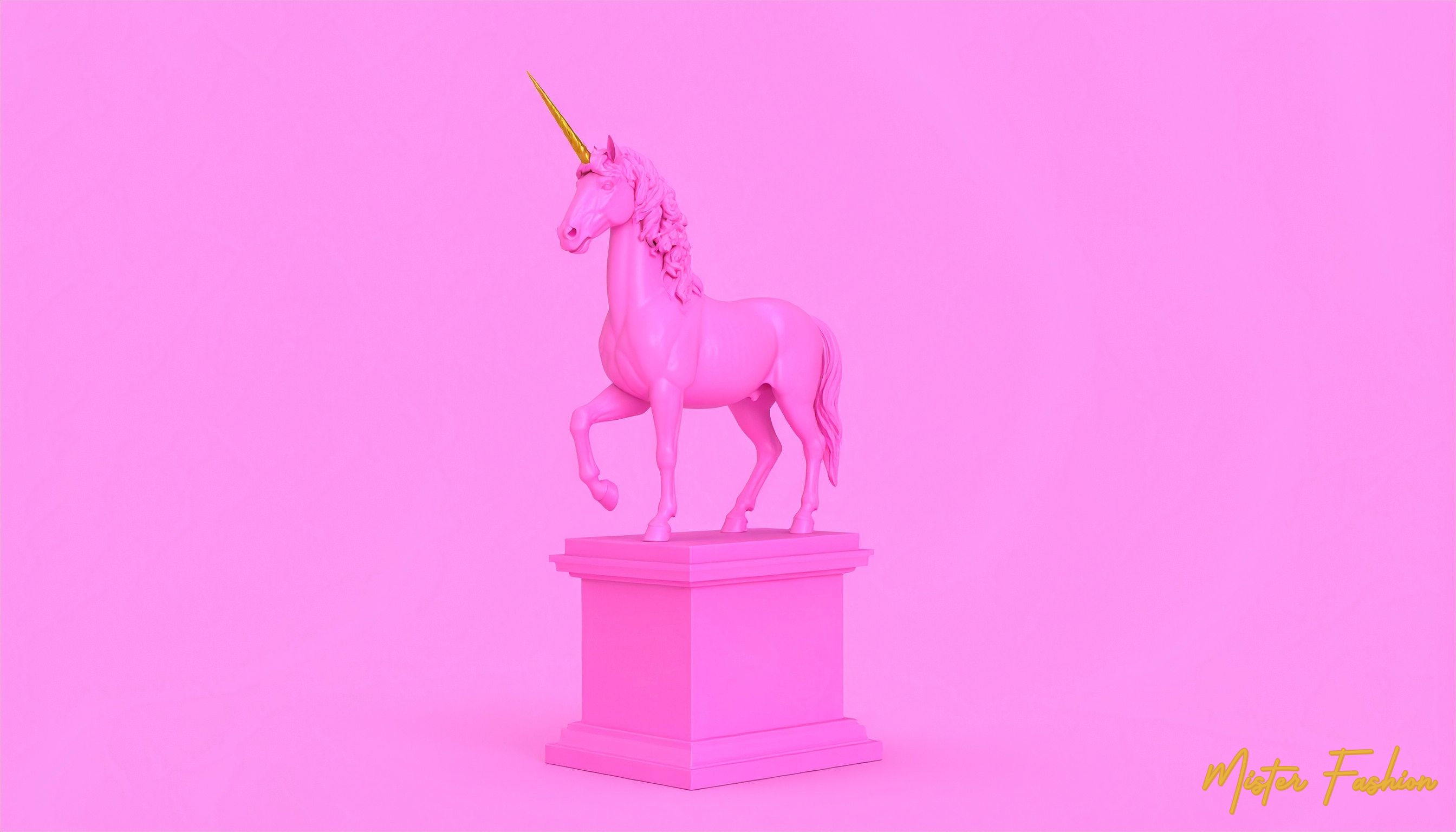 a pink unicorn statue with a gold horn.