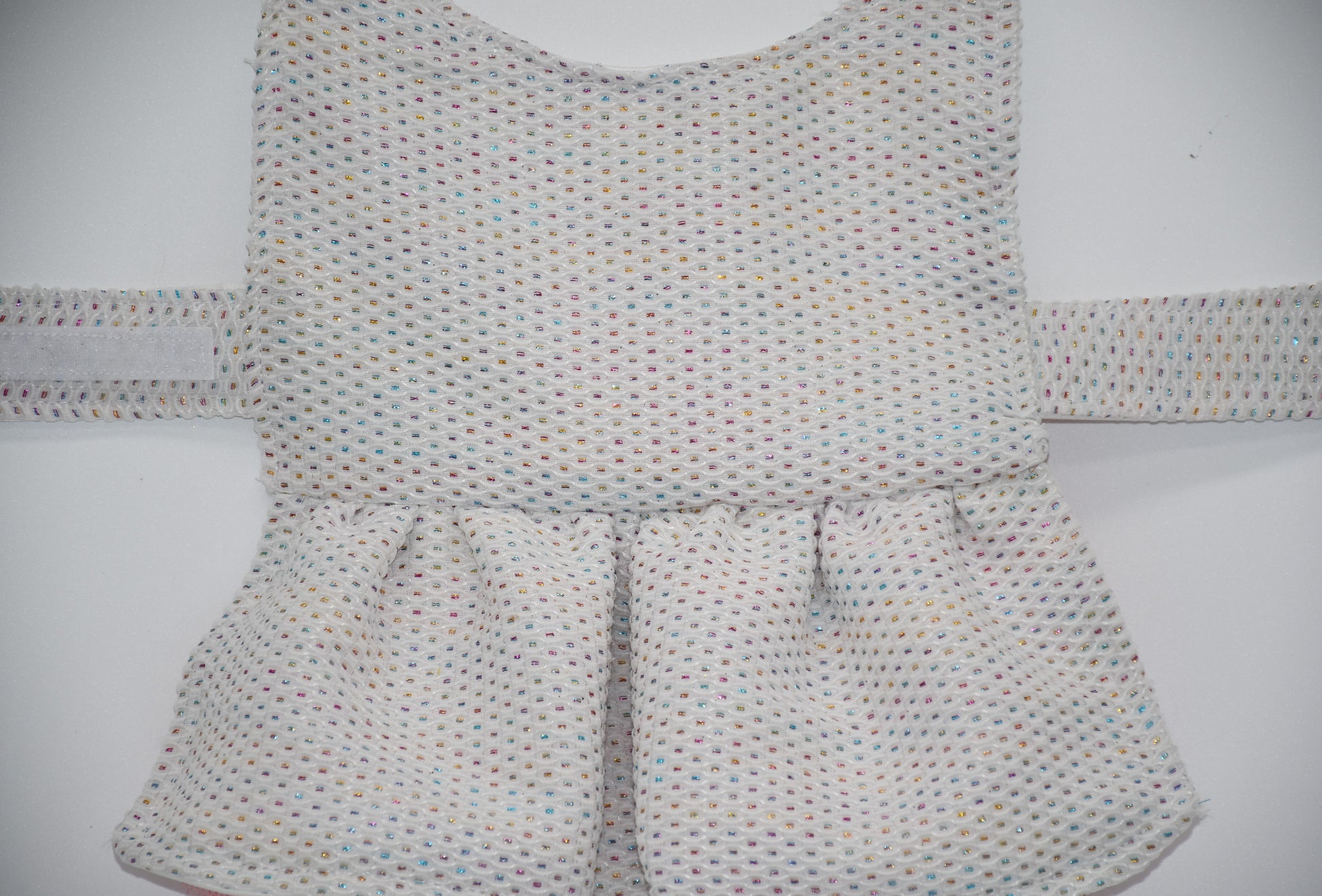 doll dog costume in colorful dots
