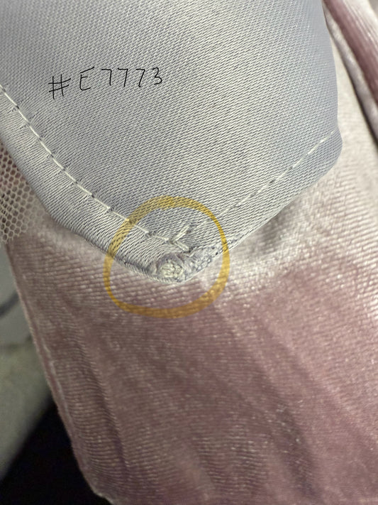 a close up of imperfection. this is an outlet dress. 