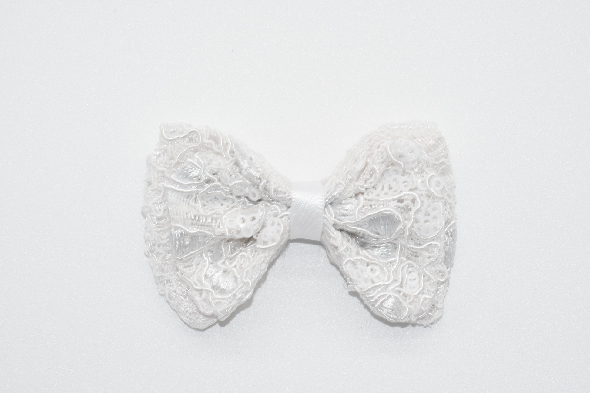 a closeup at the white lace fabric