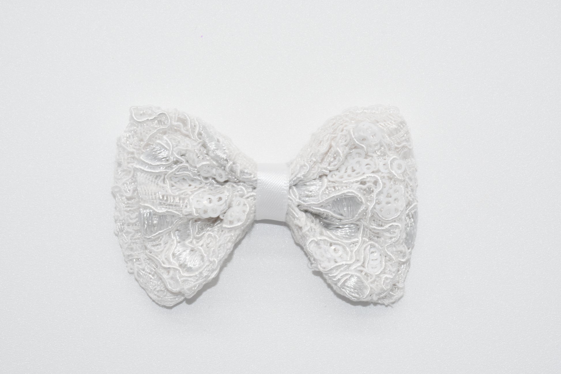 white ace fabric with sequins