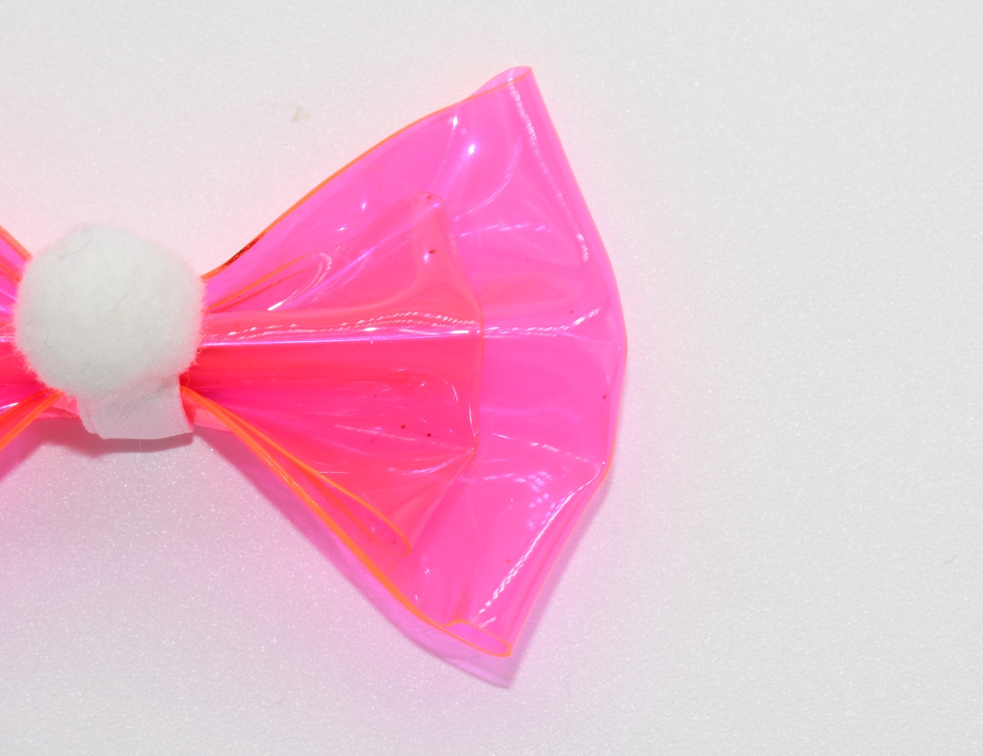 pink hairbow with pom pom 