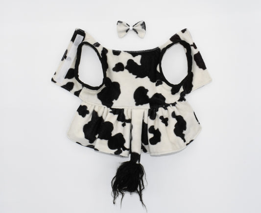 a view of the dress and the hair bow
