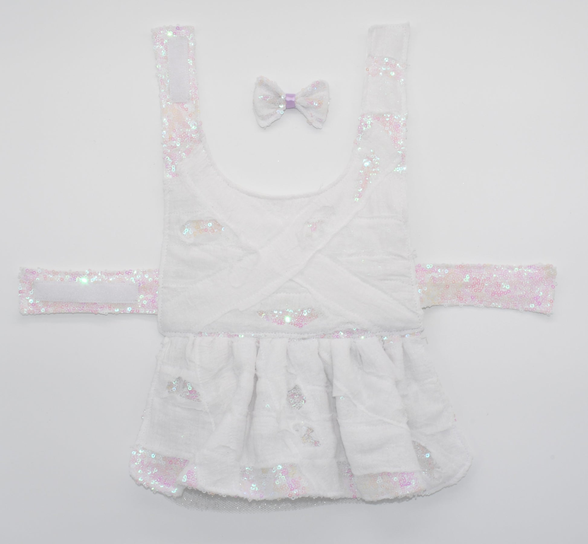 a view of the entire dress and pet hair bow