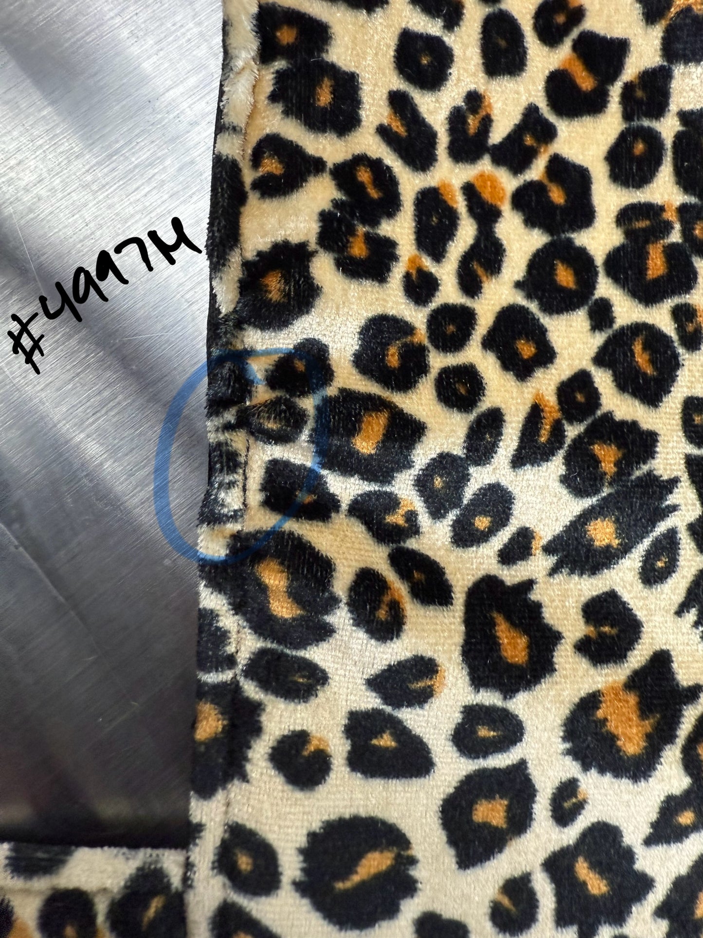 this photo shows what the outlet dress looks like. it shows an imperfection. it shows a close up.