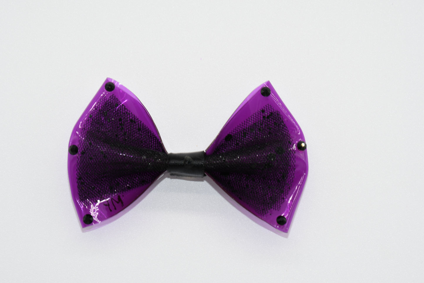 a view of the pet hairbow with black crystals. 