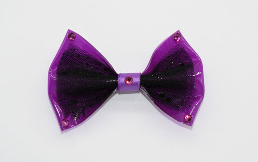 a close up at pet hairbow with crystals