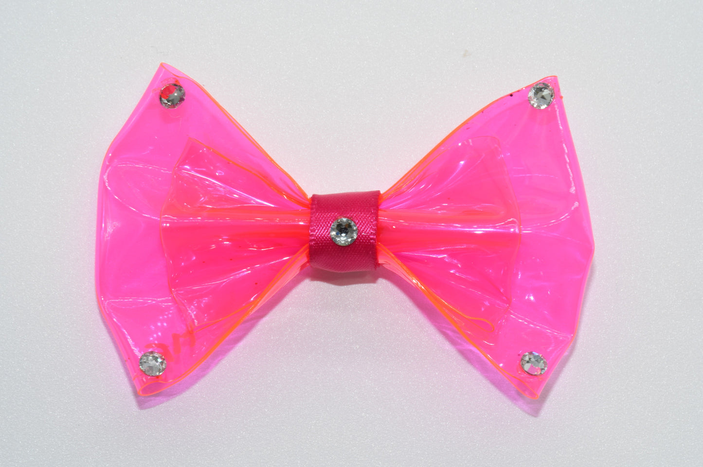 a closeup at the pet hairbow with crystals